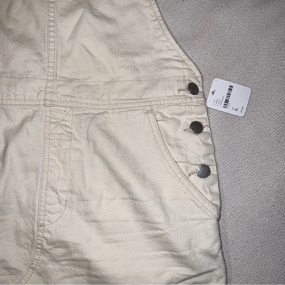 Free people torn up distressed denim jumper in white - Picture 7 of 9